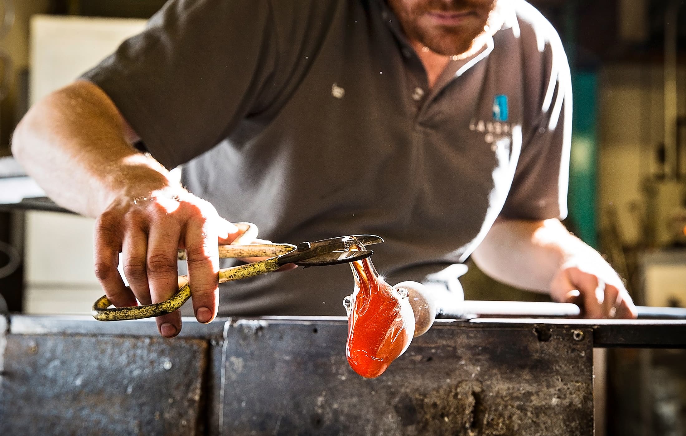 An artisan crafting memorial glass